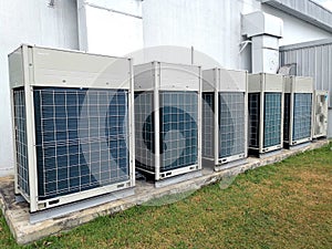 AirÃ¢â¬â¹ conditionerÃ¢â¬â¹ condencingÃ¢â¬â¹ unitsÃ¢â¬â¹ inÃ¢â¬â¹stallÃ¢â¬â¹ed outdoor photo